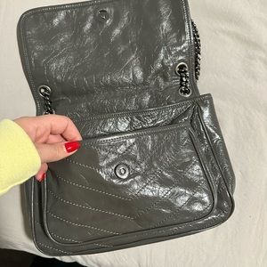 Very litttle scratch at the YSL sign